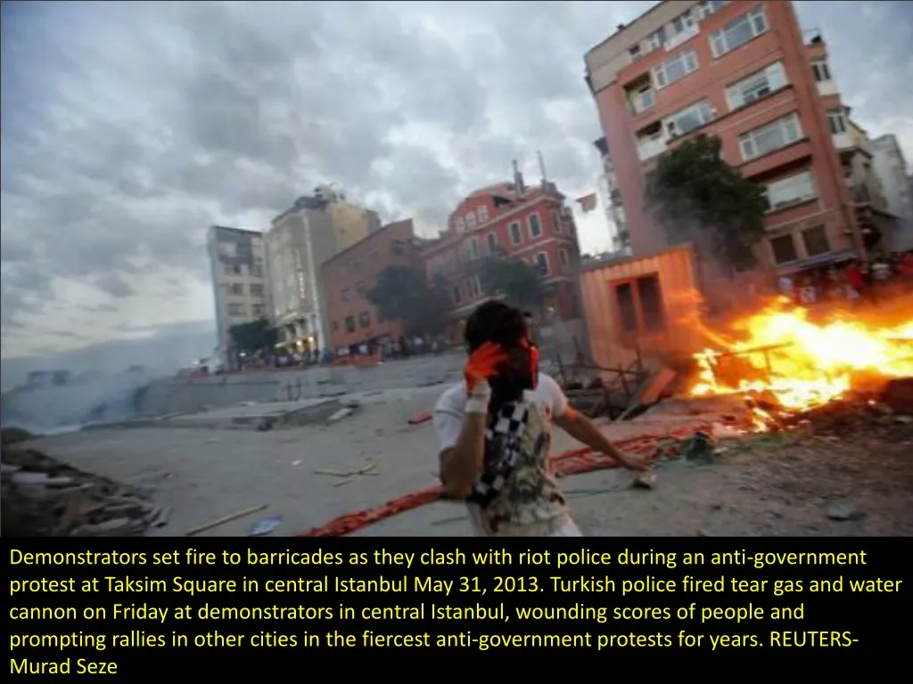 demonstrators set fire to barricades as they n.