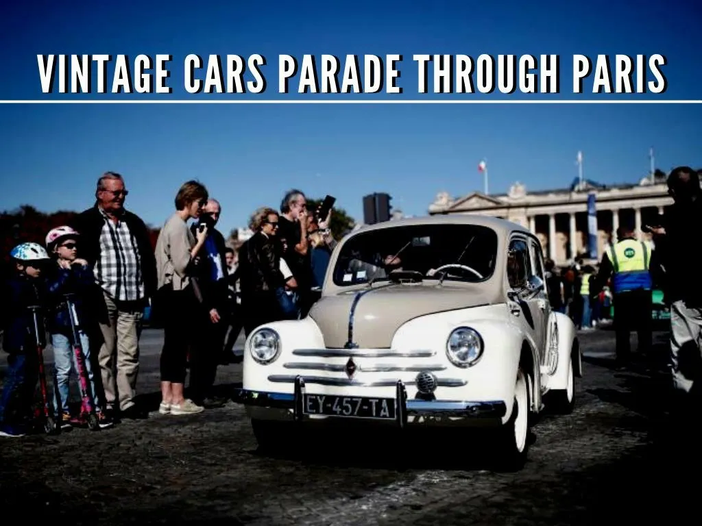 vintage cars parade through paris n.